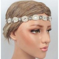 Пов'язка на голову Гетсбі «Pearl Elegance» 1920-ті, біла, з кристалами та перловим декором Пов'язка на голову Гетсбі «Pearl Elegance» 1920-ті, біла, з кристалами та перловим декором